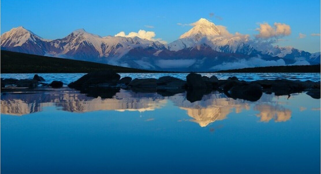 Lengga Lake (4,500 m) — the reflection everyone comes for